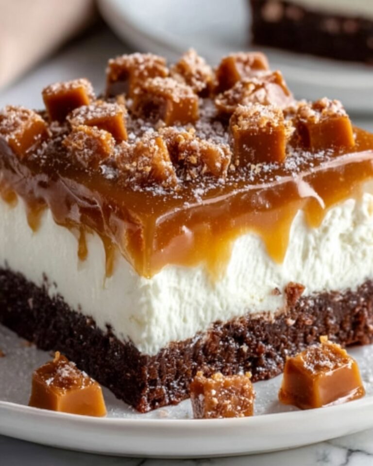 Butterfinger Candy Bar Poke Cake Recipe