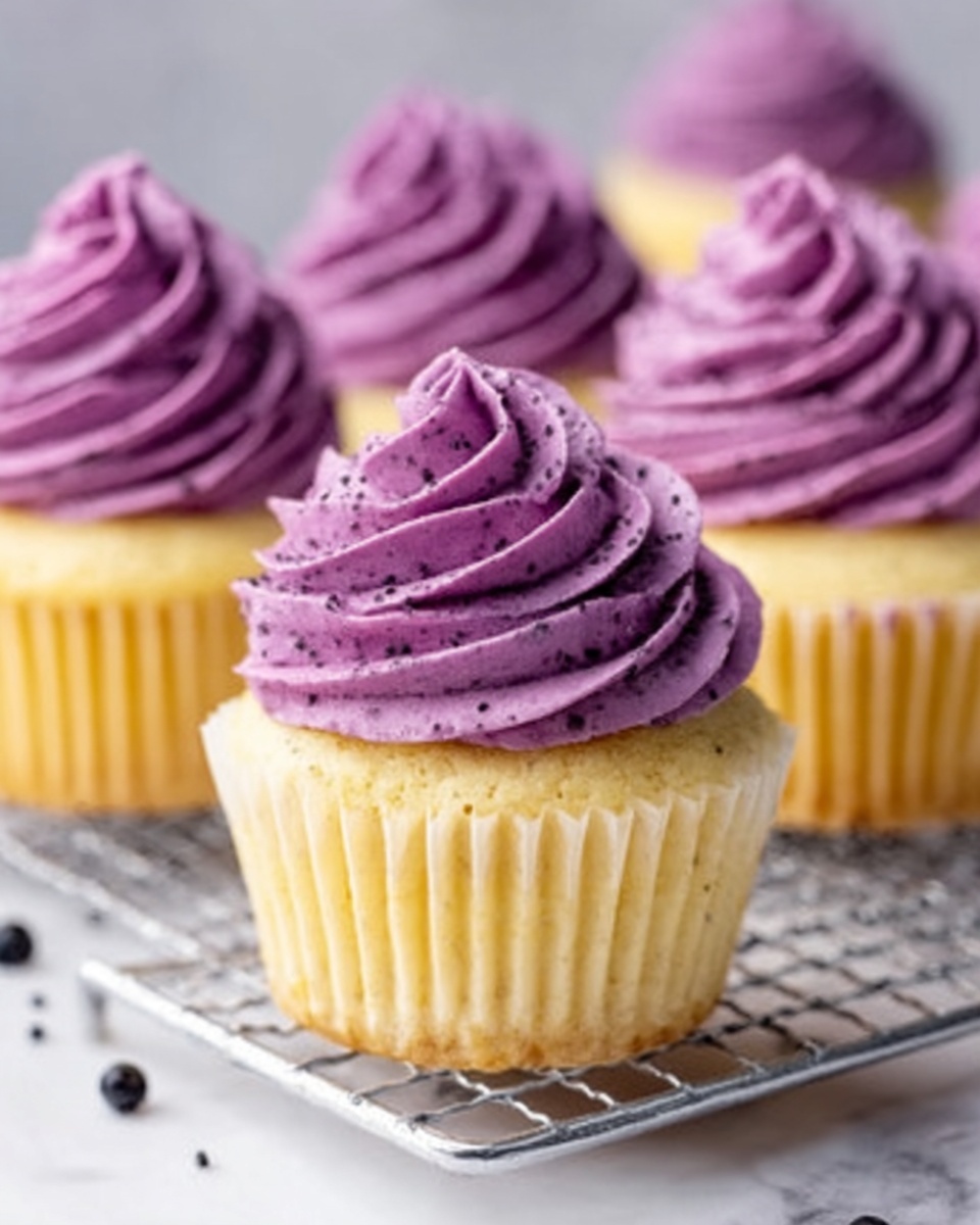 Lemon Poppy Seed Cupcakes with Blackberry Frosting Recipe - Recipe Image