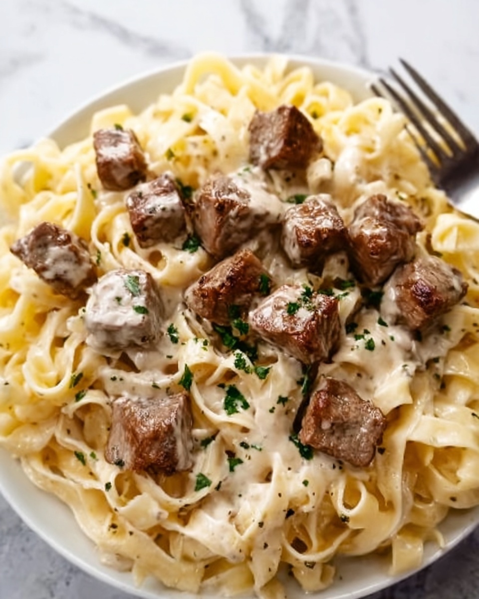 Garlic Butter Steak Bites with Creamy Parmesan Pasta Recipe - Recipe Image