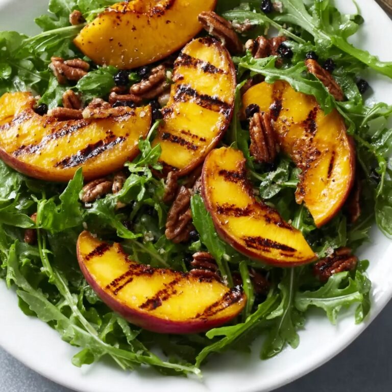 Grilled Peach Salad with Honey Vinaigrette, Candied Curry Pecans, and Fresh Blueberries Recipe